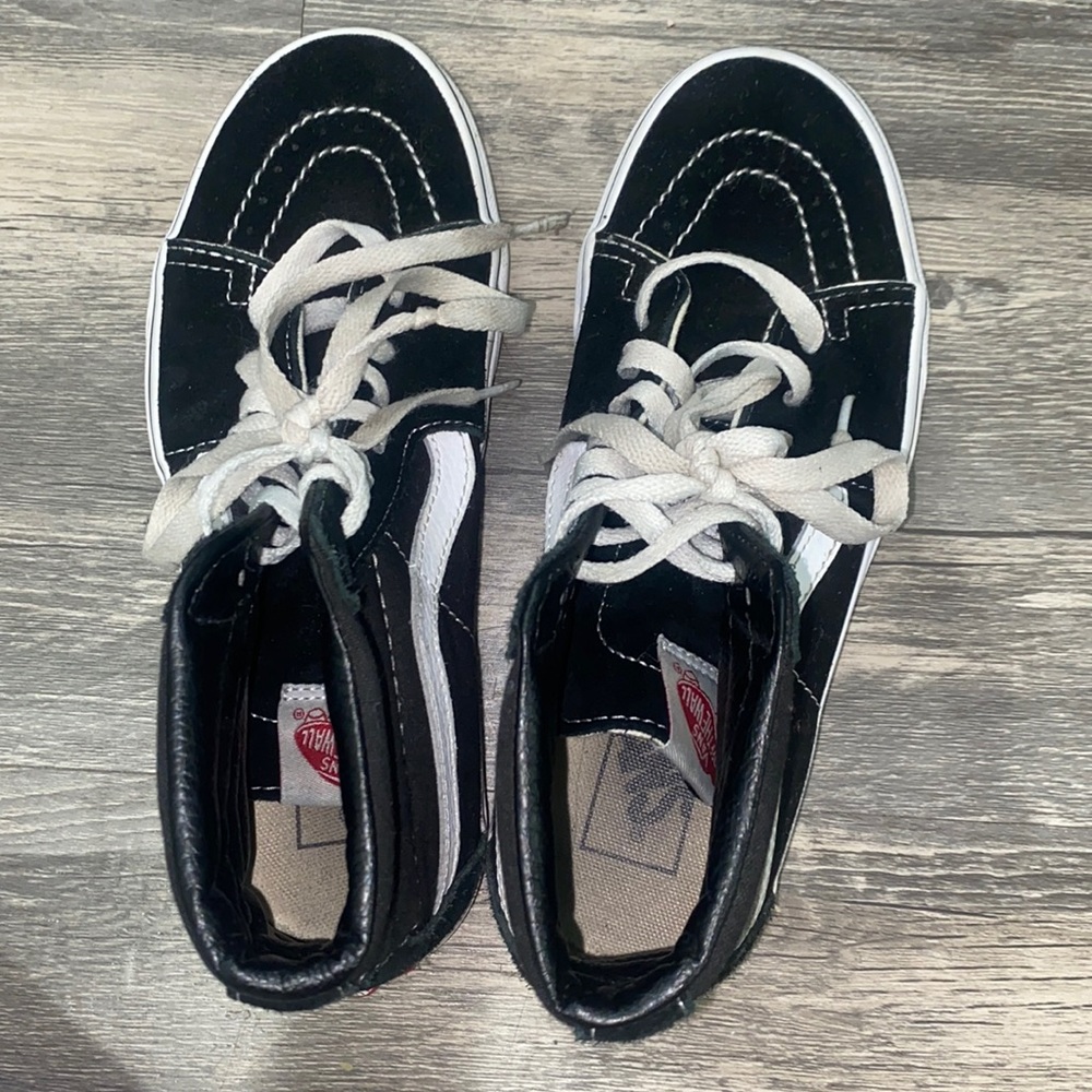 I’m selling these high top vans!